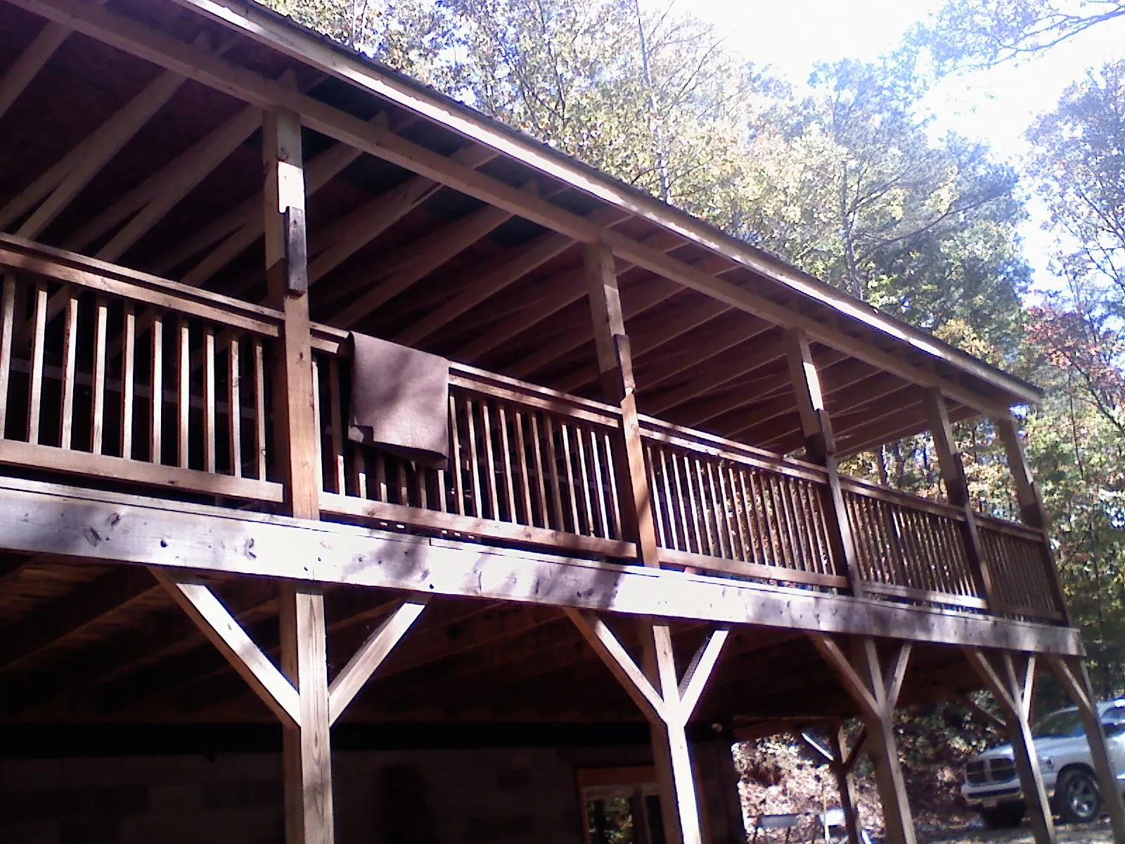 Timber framing under a new elevated porch and deck — Roof Leak Repair in Pleasant Lake by Roofing Brothers